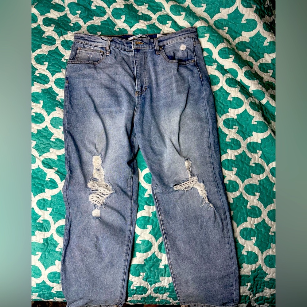 Ripped kneed jeans
